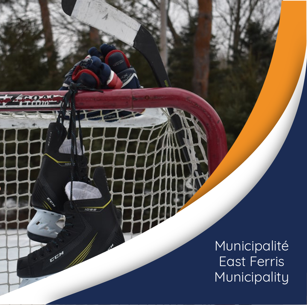 Skates Hanging on Hockey Net